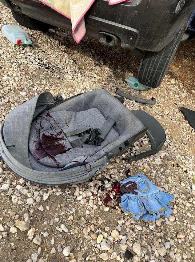 وشوهد مقعد طفل وفستان طفل ملطخين بالدماء في أعقاب الهجوم